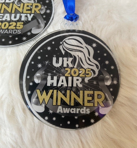 Round acrylic Christmas decoration with blue ribbon for UK Hair 2025 Winner Awards
